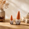 Mio und Mino, zwei dekorative Herbst-Gnome mit hohen Zipfelmützen in gedeckten Farben